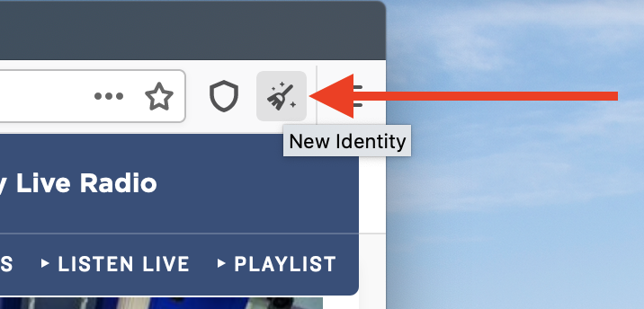 The New Identity button is in the top-right corner of the browser, and is shaped like a broom.